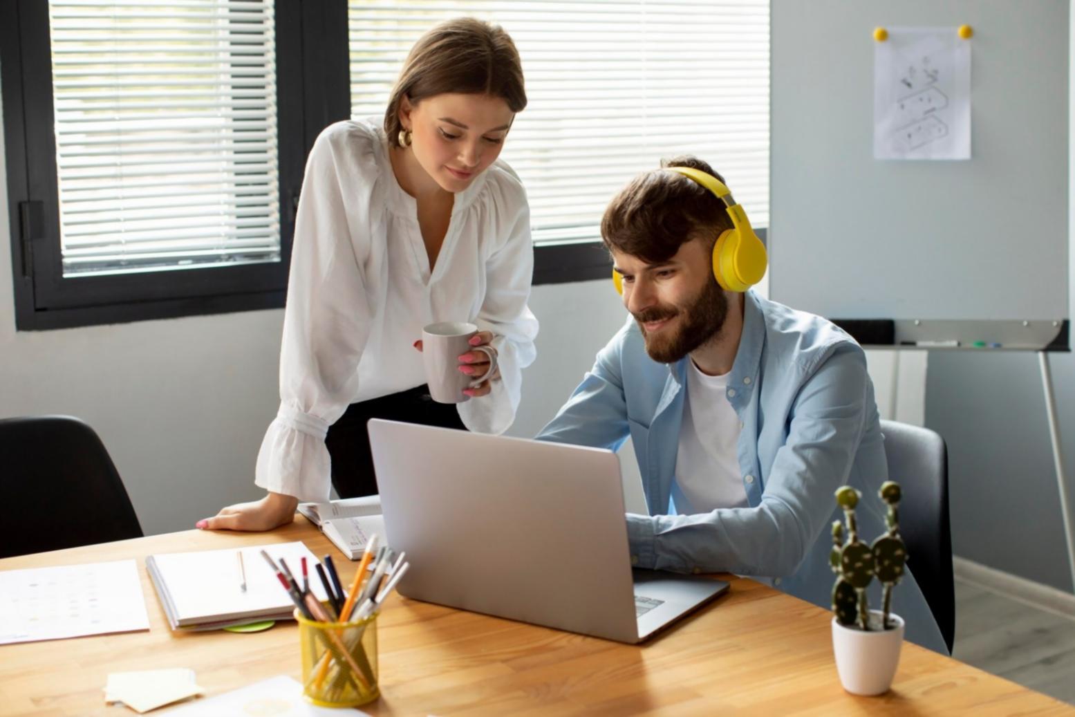 Collaborative workspace showing web design process and tools